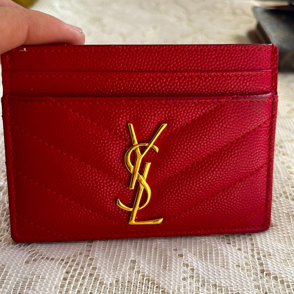 YSL red cards holder used in very good condition.made in Paris.